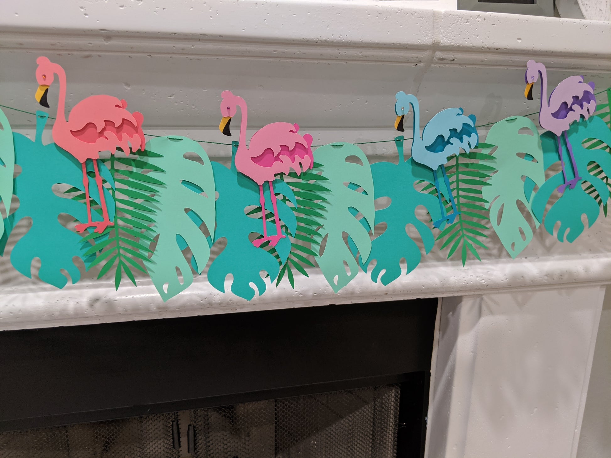 Cappa creations hand made paper banner, pool party decor, handmade designs, Hawaiian/ ocean birthday party theme, surfer birthday, tropical flamingo banner, birthday celebration, luau, bbq, tropical flamingos with monstera and palm leaves, colorful tropical birds
