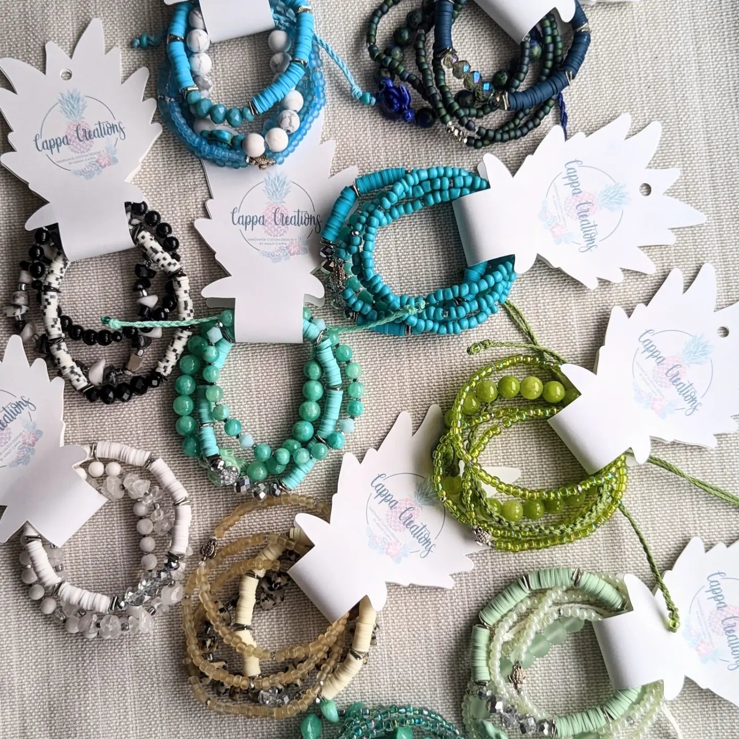 Cappa Creations Tropical bohemian jewelry inspired by the ocean and made with aloha, featuring our customizable beachy bracelets stacks