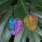 Lightweight rainbow Monstera dangling earrings, rainbow anodized stainless steel. Handcrafted by Cappa Creations, made of stainless steel, making them the highest quality, waterproof, tarnish proof, hypoallergenic, and nickel free! 

Perfect to wear on a beautiful summer day or  the sweetest gift for any plant lover! 