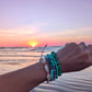 Cappa Creations Tropical bohemian jewelry inspired by the ocean and made with aloha, featuring our customizable beachy bracelets stacks