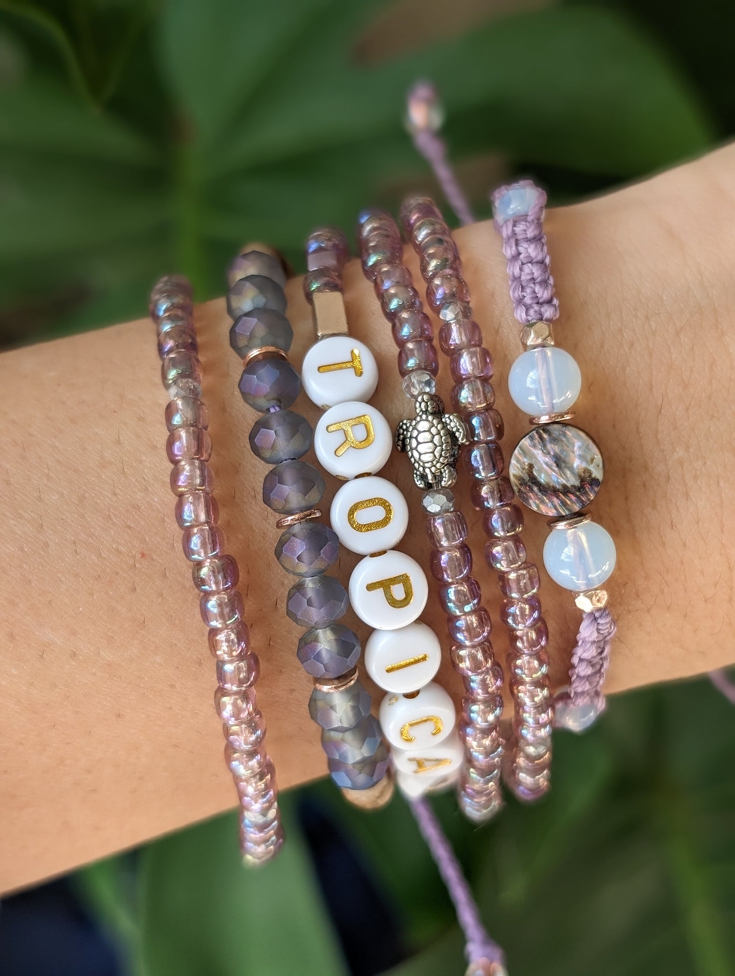 Cappa Creations Tropical bohemian jewelry inspired by the ocean and made with aloha, featuring our customizable beachy bracelets stacks