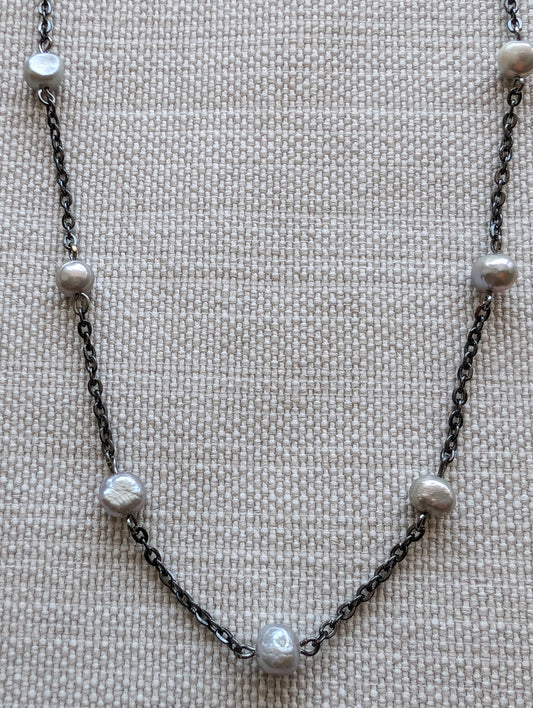 Elevate your style with our Dainty Lavender Pearl Necklace! This elegant piece features delicate lavender grey pearls on a sleek gunmetal chain. Perfect for any occasion, this necklace adds a touch of sophistication to any outfit. Upgrade your jewelry collection today! layered bohemian necklaces by cappa creations, tropical beachy jewelry, freshwater pearls, layered necklaces