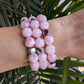 Breast Cancer Awareness bracelet with rose quartz and silver hematite beads symbolizing healing, strength, and love.