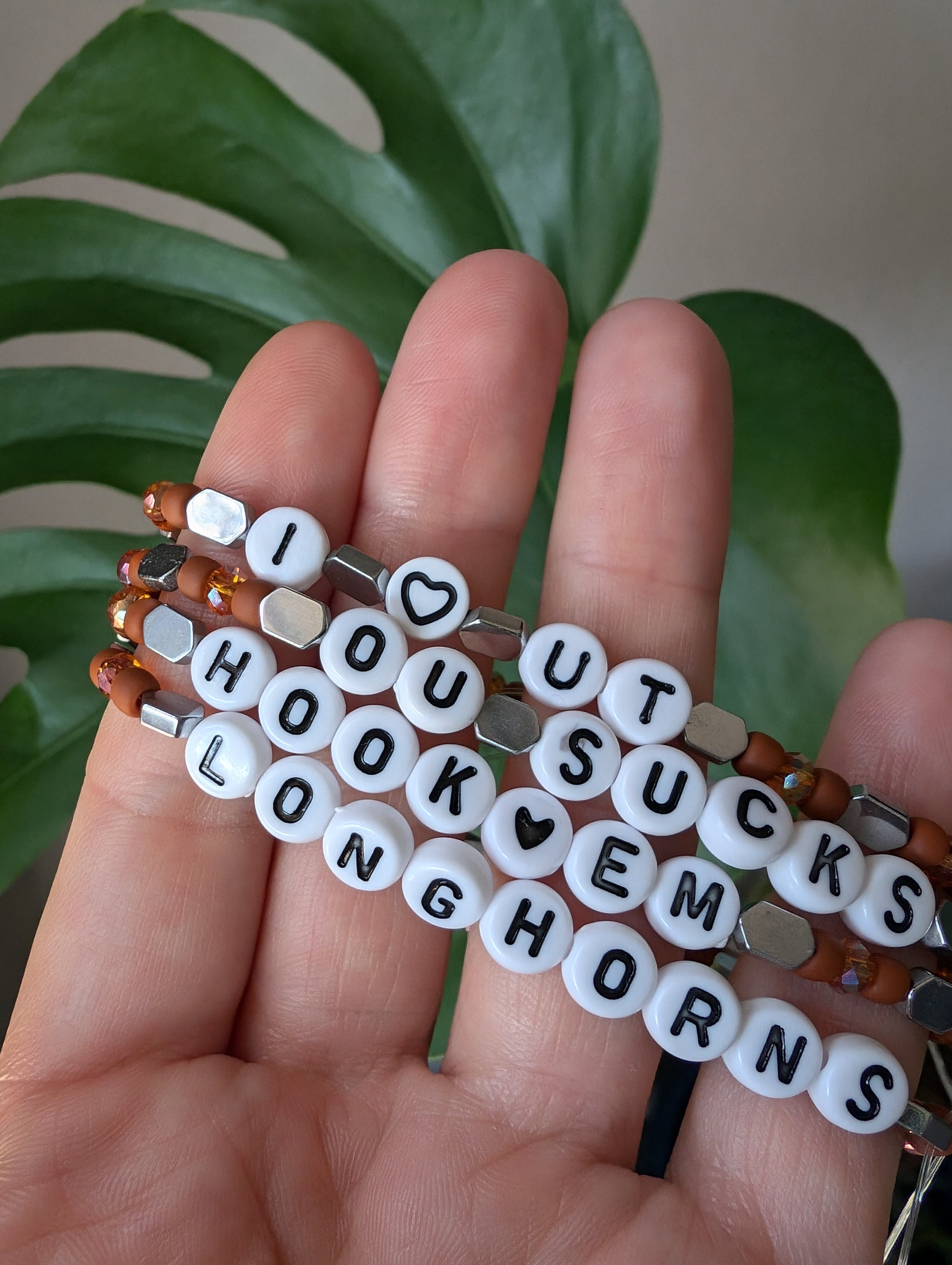 Texas Vibes stretchy silver hematite bracelet featuring Czech glass seed beads and faceted crystal glass beads, perfect for game day team spirit and stacking